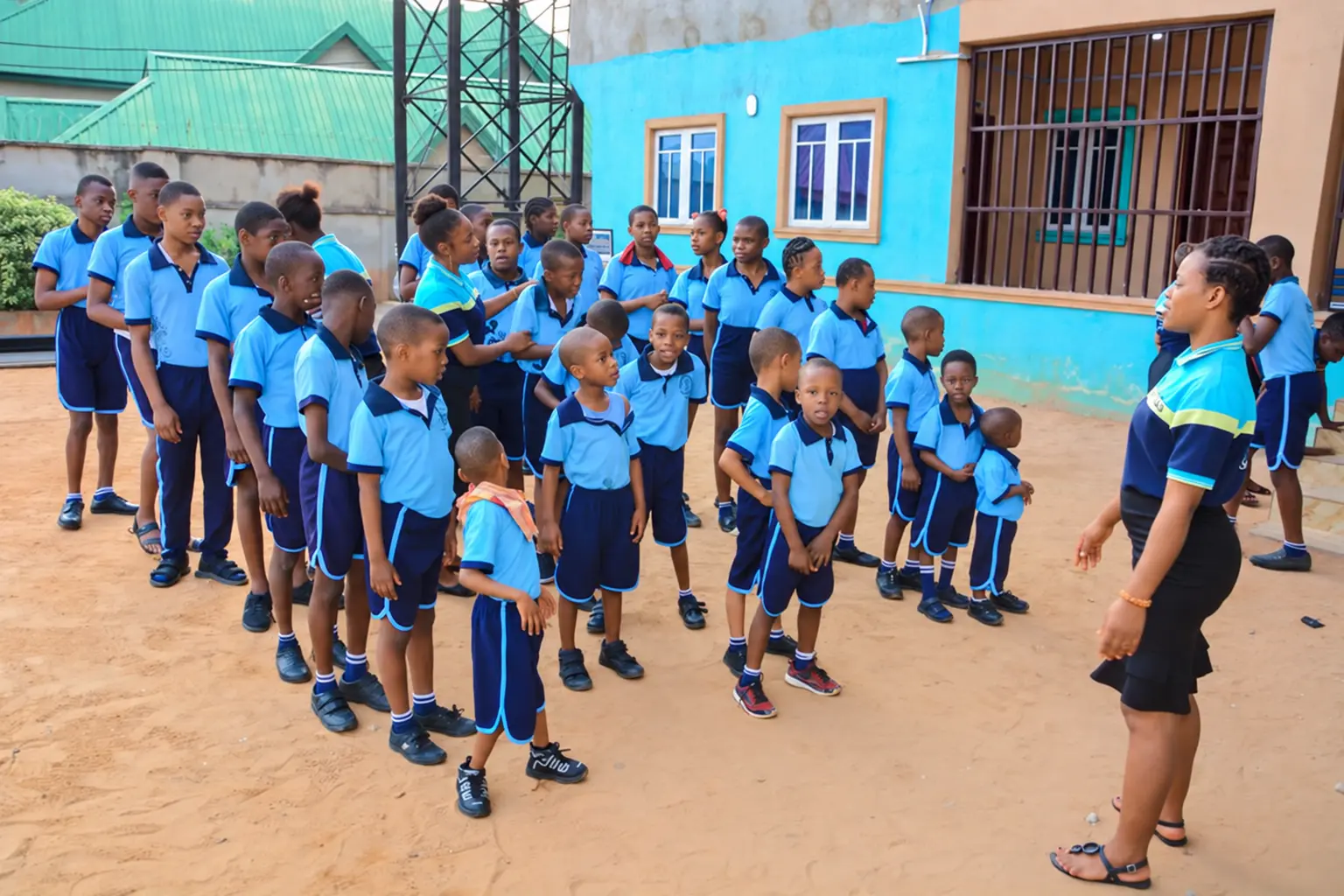 Children and staff sharing time together in the school courtyard